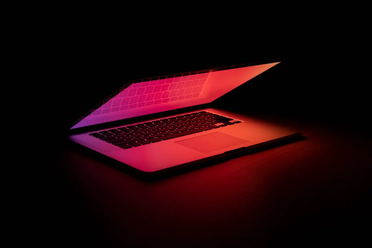 Digital artist working on creative project at desk