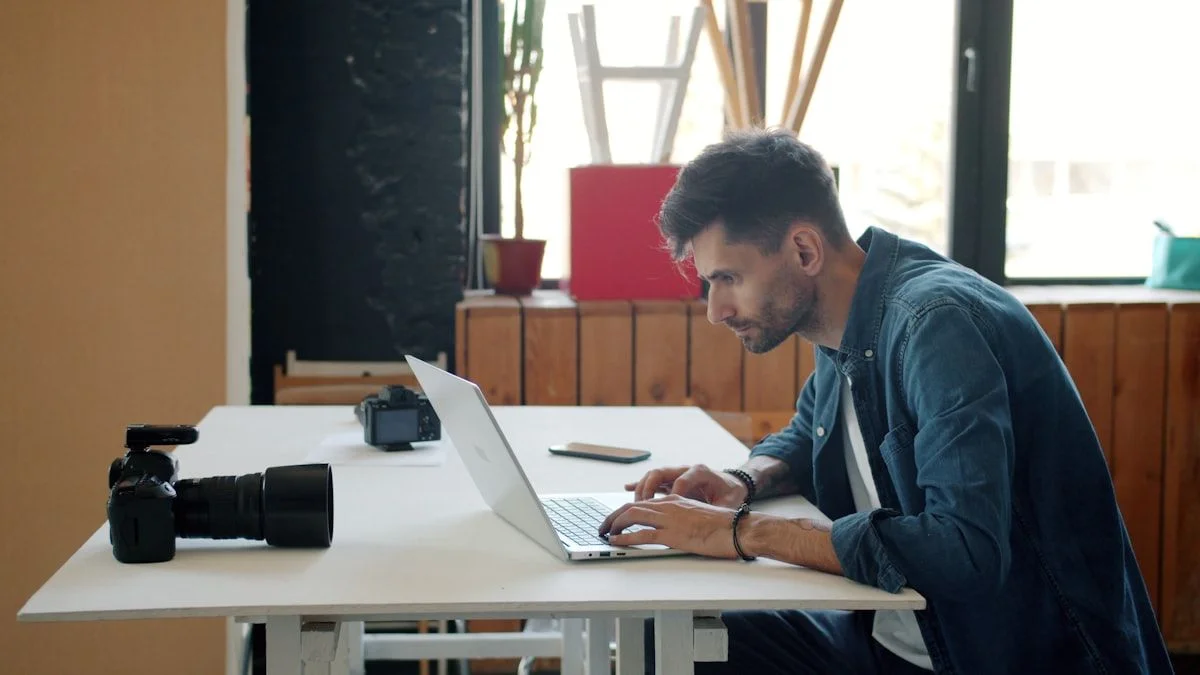 Photographer editing on laptop
